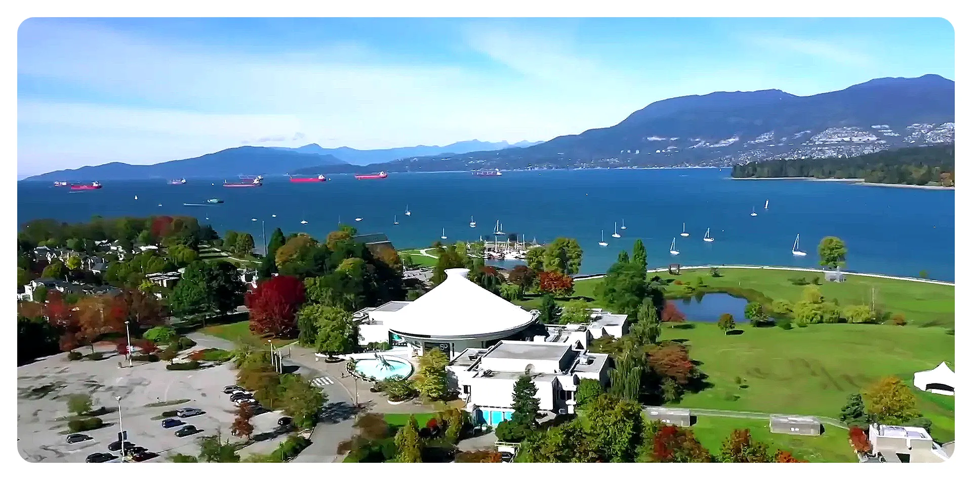 Stanley Park and Vancouver coastline with mountains in the background
