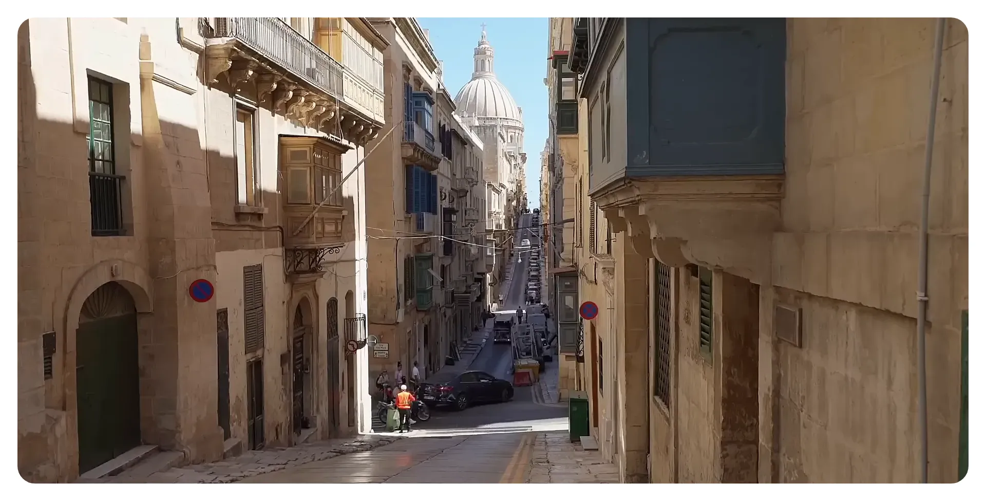 Limestone buildings glowing under Mediterranean sun in Valletta