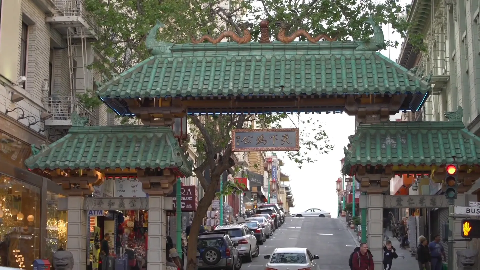 Bustling street scene in San Francisco Chinatown with traditional decorations