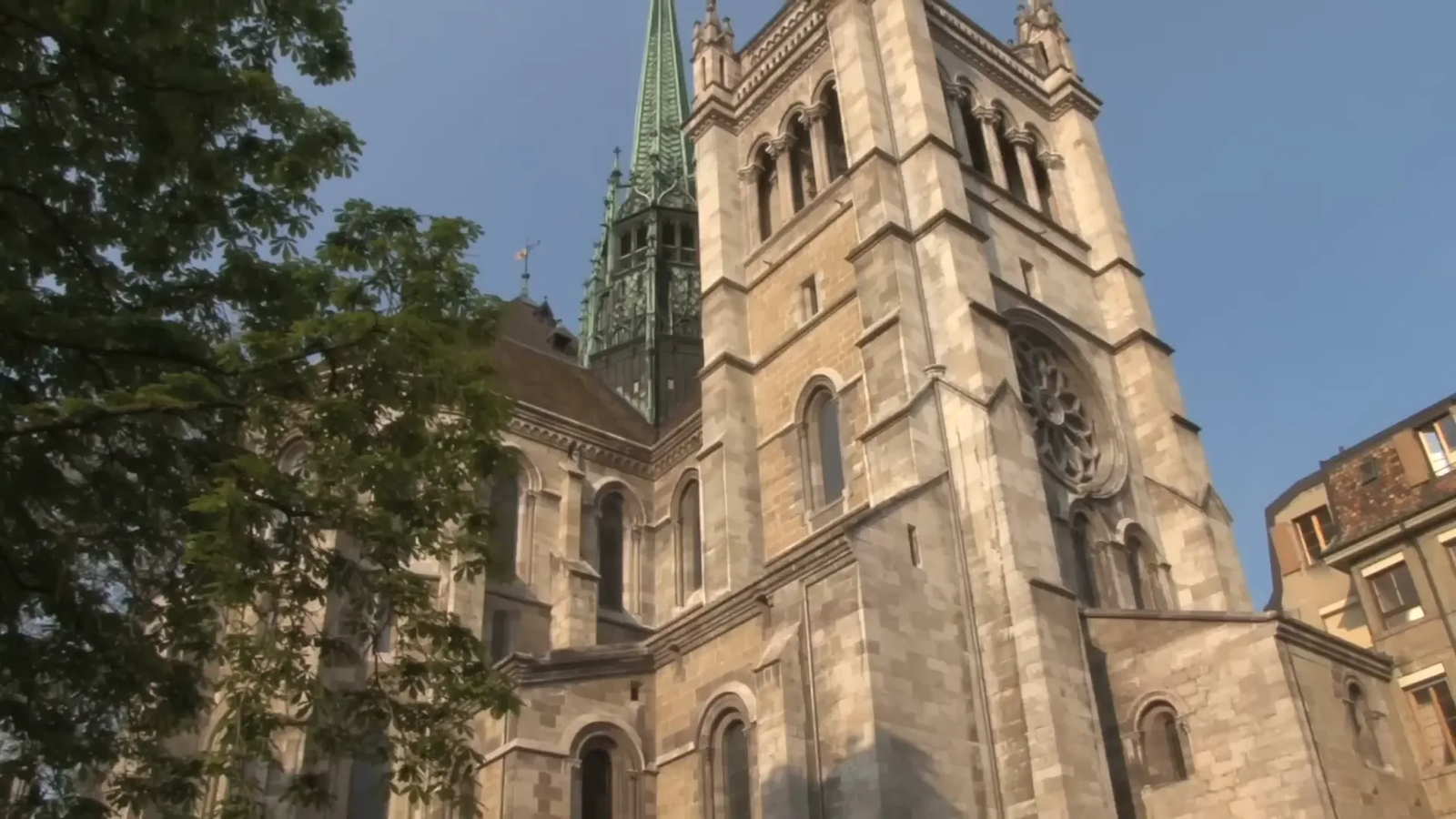 Geneva cityscape with the Cathedral of St. Pierre and Lake Geneva