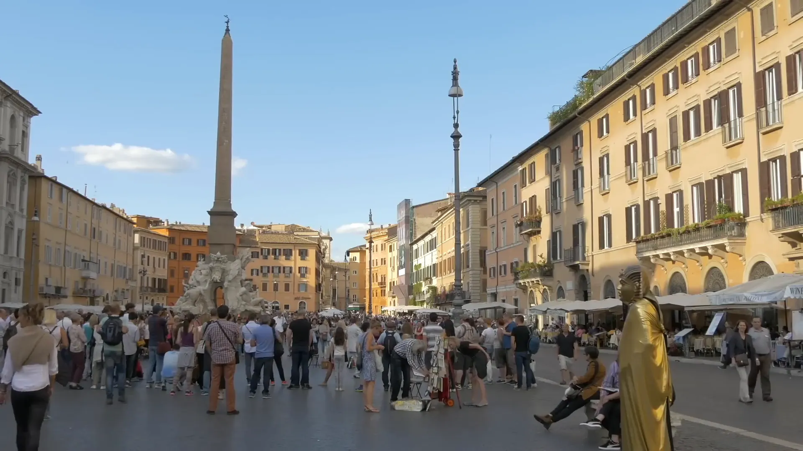 Piazza Navona filled with people and its central fountain