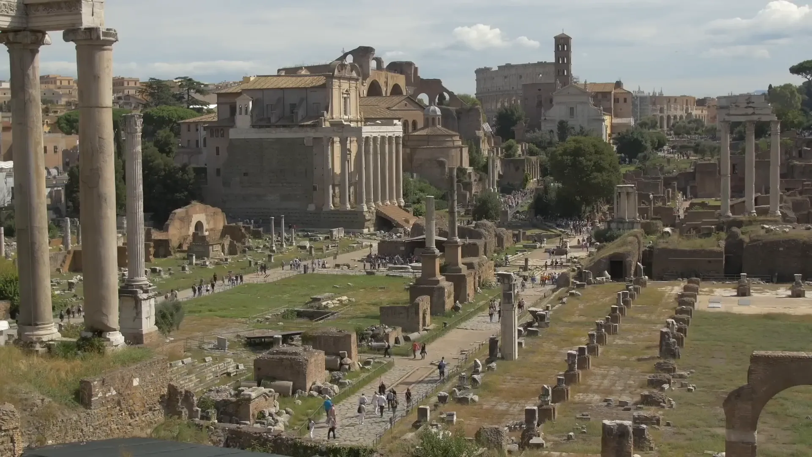 Ruins of the Roman Forum with columns and arches