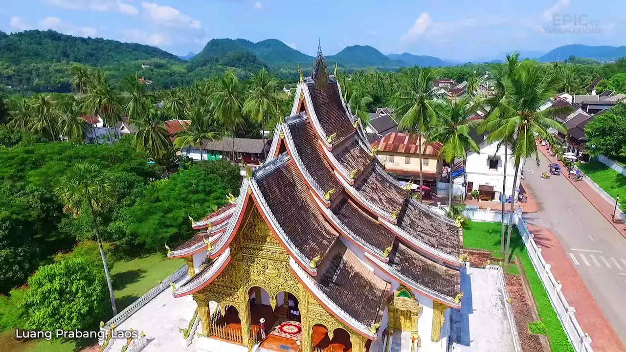 Monks in Luang Prabang during a morning alms procession through quiet streets
