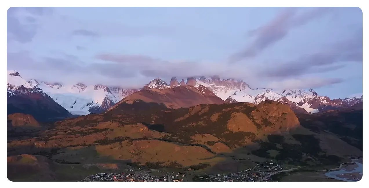 Mount Fitzroy's jagged profile over glacial lake in Patagonia