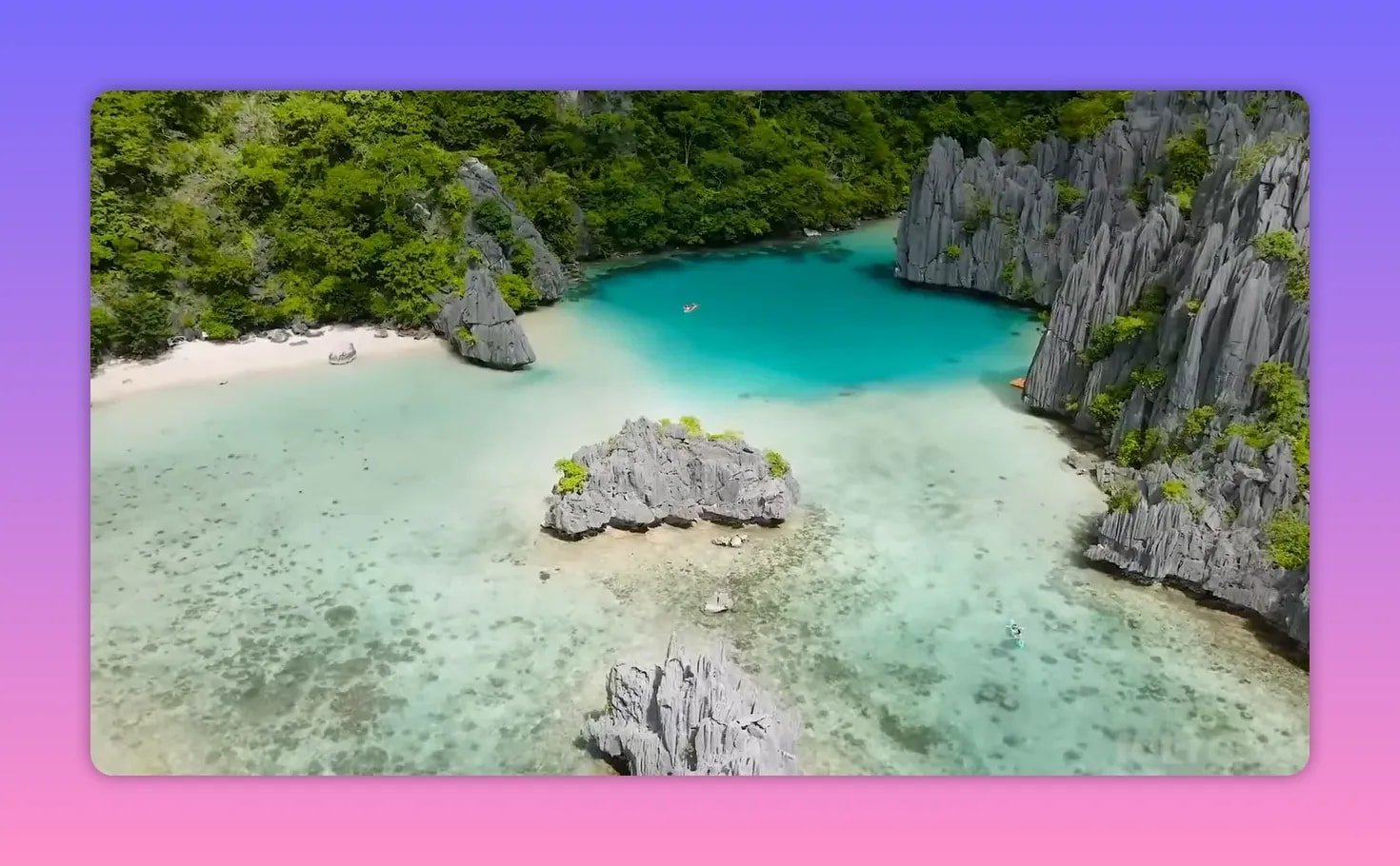 High-resolution aerial image of a bright turquoise lagoon, sandbanks and sharp limestone karsts in Palawan