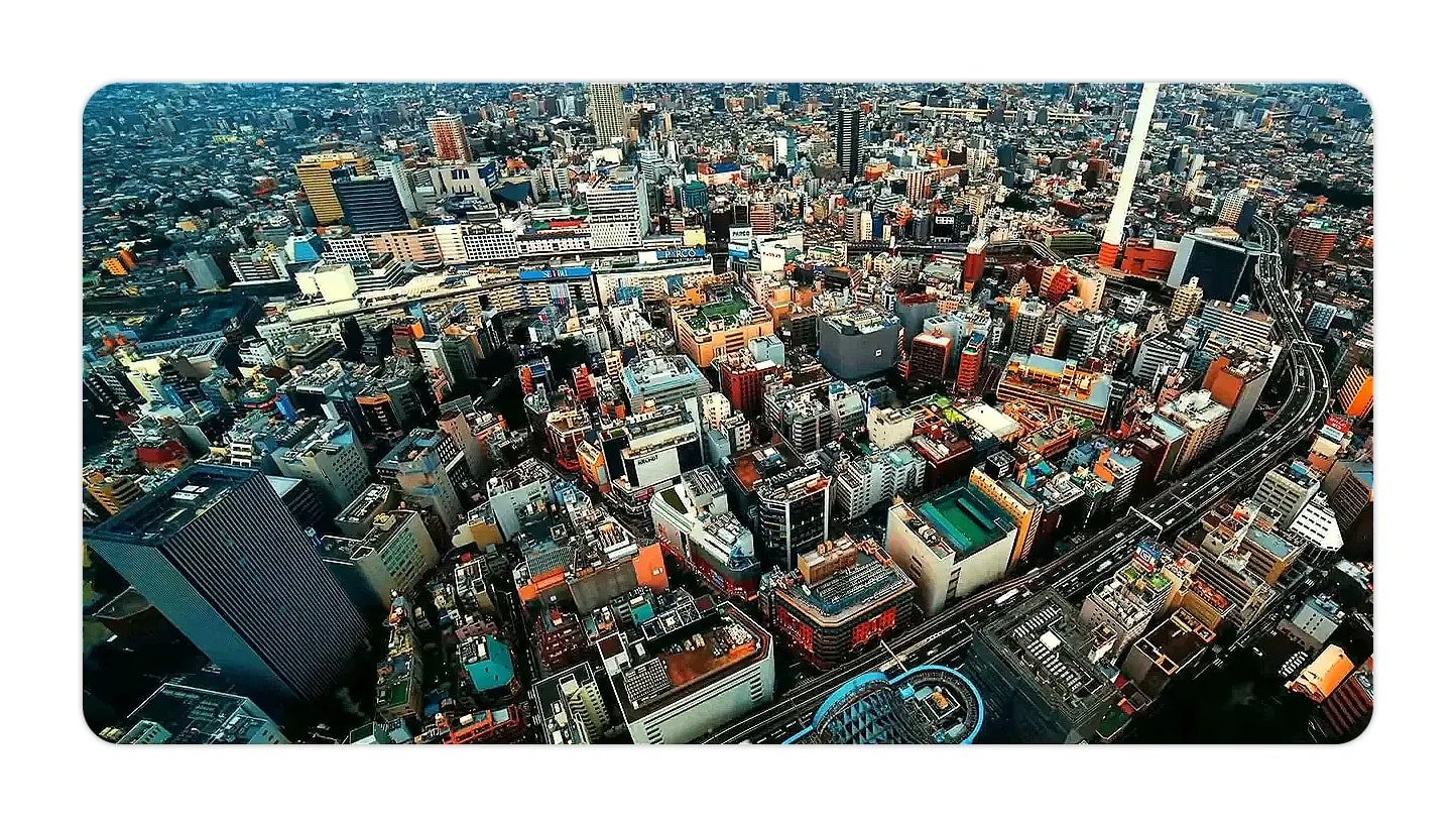 Aerial view of Tokyo cityscape with dense buildings and elevated roads